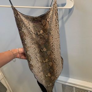 Snakeskin open back body suit